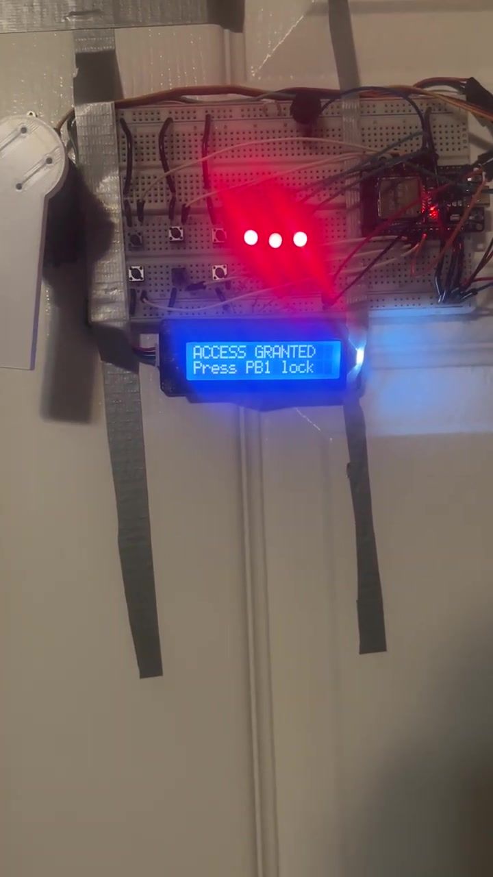 The LCD reading ACCESS GRANTED, Press PB1 to lock, after the new PIN was accepted.